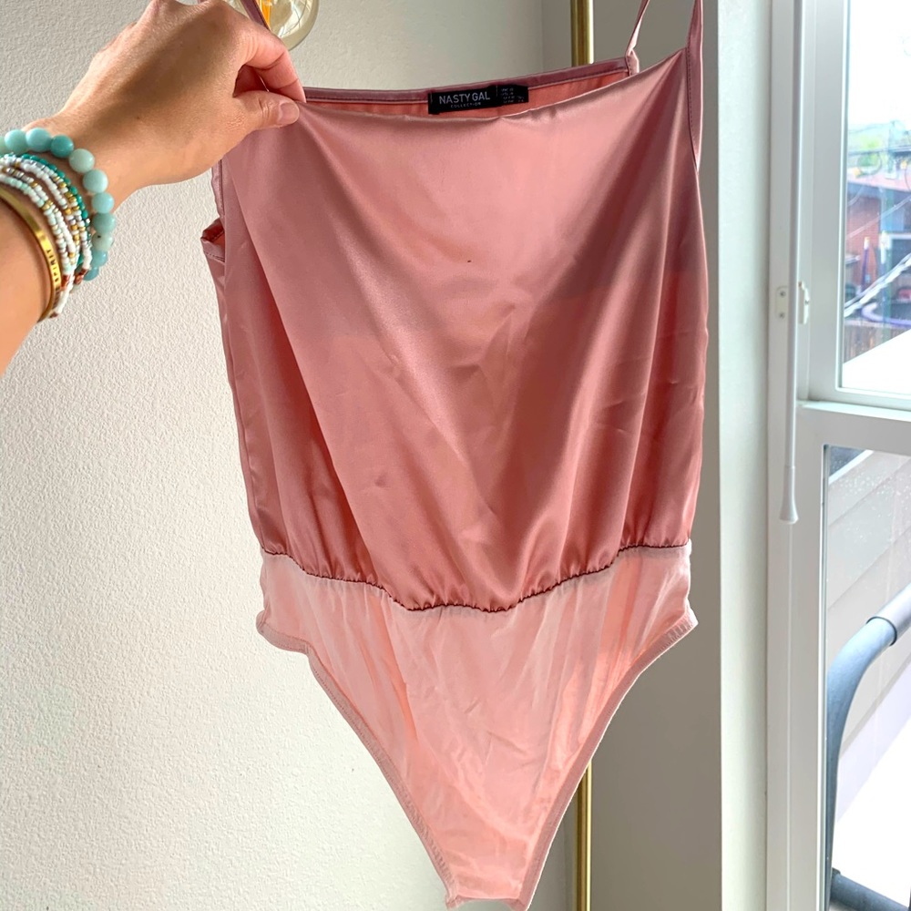 Light pink, satin body suit! Never worn